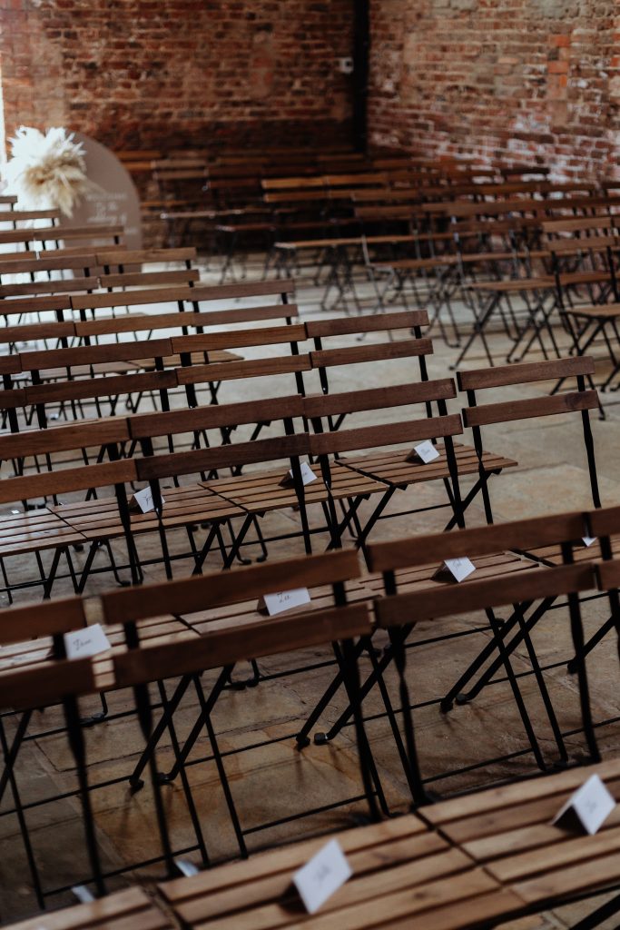 rustic wedding ceremony barn chairs